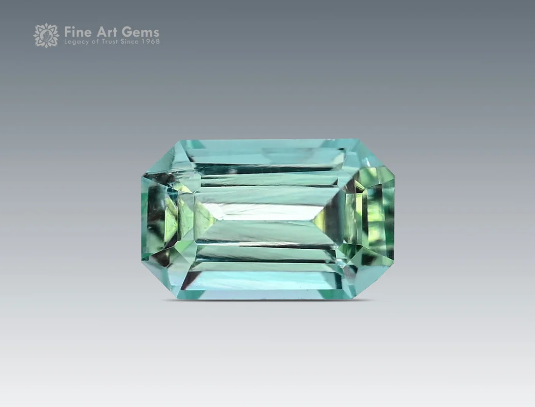 Light green Afghan tourmaline gemstone in emerald cut, one ct, natural and untreated.