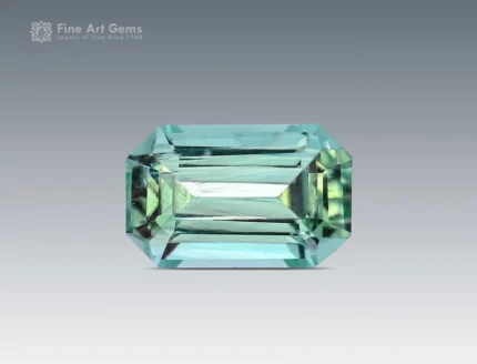 Light green Afghan tourmaline gemstone in emerald cut, one ct, natural and untreated.