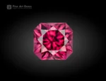 A 1-carat cushion-cut rhodolite garnet from Africa with vivid raspberry pink color, bright internal reflections, and clean faceting.