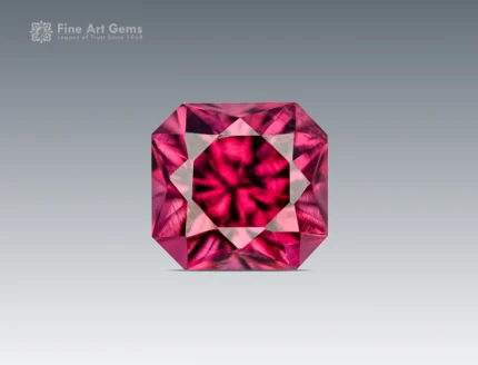 A 1-carat cushion-cut rhodolite garnet from Africa with vivid raspberry pink color, bright internal reflections, and clean faceting.