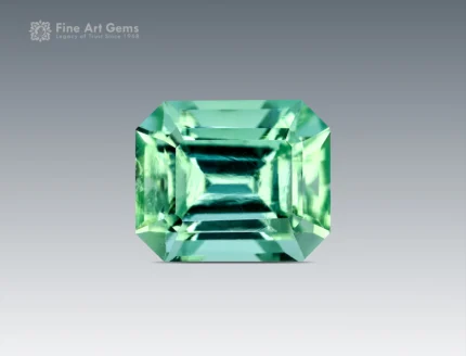 Light mint green emerald-cut tourmaline gemstone from Afghanistan, 1.40 carats, with sharp faceting and bright gemmy clarity.