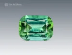 1.95 carat cushion-cut Afghan tourmaline featuring soft green tones and bright reflections.