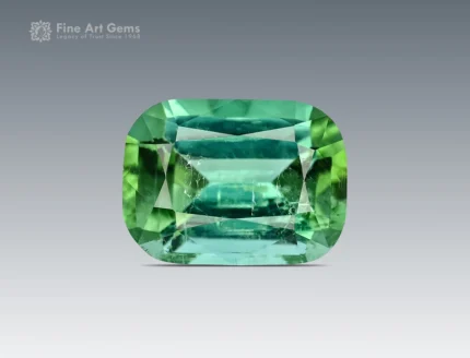 1.95 carat cushion-cut Afghan tourmaline featuring soft green tones and bright reflections.