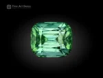 Green cushion-cut tourmaline gemstone weighing 2.15 carats from Afghanistan, faceted and gem-quality.