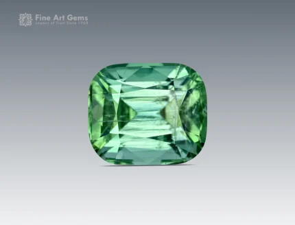 Green cushion-cut tourmaline gemstone weighing 2.15 carats from Afghanistan, faceted and gem-quality.