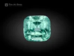 Natural light green Afghan tourmaline, 2.25 ct, cushion cut with visible inclusions.