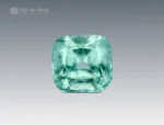 Natural light green Afghan tourmaline, 2.25 ct, cushion cut with visible inclusions.