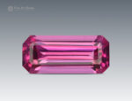 Hot pink emerald cut rhodolite garnet from Africa, 1 carat, eye-clean clarity.