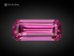 Hot pink emerald cut rhodolite garnet from Africa, 1 carat, eye-clean clarity.
