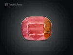 Bi-color cushion-cut tourmaline with natural color zoning, internal patterns, and balanced faceting from Afghanistan.