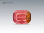 Bi-color cushion-cut tourmaline with natural color zoning, internal patterns, and balanced faceting from Afghanistan.