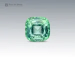 Fine cushion cut green tourmaline gemstone with faceted clarity and vibrant color from Afghanistan.