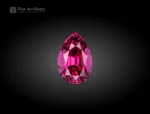 Pear-cut rhodolite garnet gemstone with vivid raspberry color and clean faceting from Africa.