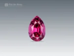 Pear-cut rhodolite garnet gemstone with vivid raspberry color and clean faceting from Africa.