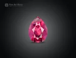 Pear-cut rhodolite garnet gemstone with vivid raspberry color and clean faceting from Africa.