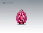 Pear-cut rhodolite garnet gemstone with vivid raspberry color and clean faceting from Africa.