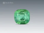 Green cushion-cut tourmaline with natural internal patterns and balanced faceting from Afghanistan.