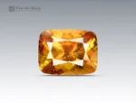 Fine 2-carat faceted sphene gemstone with gemmy golden-yellow color, cushion cut, and strong brilliance from Pakistan.