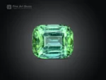 Green cushion-cut tourmaline with natural internal patterns and balanced faceting from Afghanistan.
