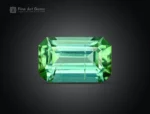 Faceted 2.25 carat emerald cut green tourmaline gemstone from Afghanistan, suitable for fine jewelry use.