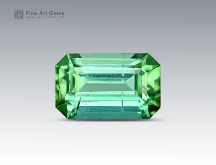 Faceted 2.25 carat emerald cut green tourmaline gemstone from Afghanistan, suitable for fine jewelry use.