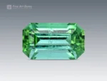 Fine emerald-cut tourmaline, 2.60 carats, Afghan origin, bright color, and gemmy clarity.