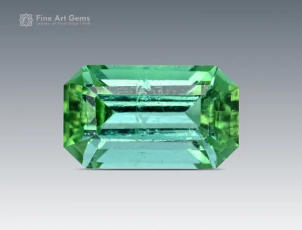 Fine emerald-cut tourmaline, 2.60 carats, Afghan origin, bright color, and gemmy clarity.