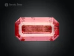 Hot pink emerald-cut tourmaline with vivid saturation, clean step faceting, and natural clarity from Afghanistan.