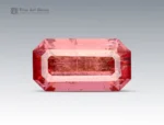 Hot pink emerald-cut tourmaline with vivid saturation, clean step faceting, and natural clarity from Afghanistan.