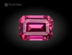 Vivid pinkish-red 1.20 carat emerald cut rhodolite garnet from Africa with excellent clarity and brilliance.