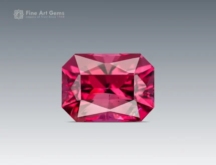 Fine cut cushion shape rhodolite garnet showing rich raspberry color and bright brilliance