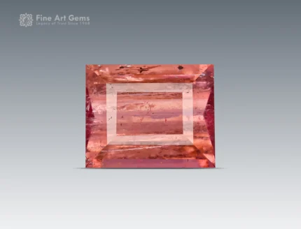Hot pink emerald-cut tourmaline with vivid saturation, clean step faceting, and natural clarity from Afghanistan.