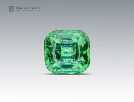 Natural 2.35 carat cushion cut tourmaline from Afghanistan with a vivid bluish-green color and excellent brilliance. Ideal for rings, pendants, or custom jewelry designs, this tourmaline reflects light beautifully, revealing depth of color and clarity.