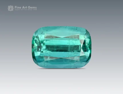 Cushion cut blue to green tourmaline gemstone from Afghanistan, showing slightly included clarity and fine faceting