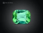 Natural cushion-cut mint-green tourmaline gemstone with lively brilliance and slight inclusions from Afghanistan.