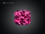 Eye-clean cushion-cut rhodolite garnet gemstone showing vivid raspberry color and fine brilliance from Africa.