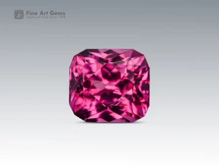 Eye-clean cushion-cut rhodolite garnet gemstone showing vivid raspberry color and fine brilliance from Africa.