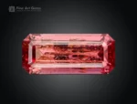 Emerald cut hot pink tourmaline gemstone from Afghanistan showing natural inclusions