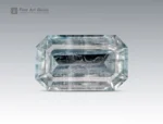 Natural emerald cut aquamarine gemstone with light blue color and visible inclusions from Pakistan.