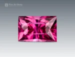 1.20 ct baguette cut rhodolite garnet showing vivid raspberry color and excellent clarity