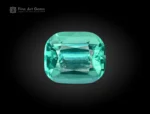 Cushion cut gemstone showing lagoon blue and green tones with natural clarity