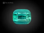 6.20 ct cushion cut gemstone showing lagoon blue and green tones with natural inclusions