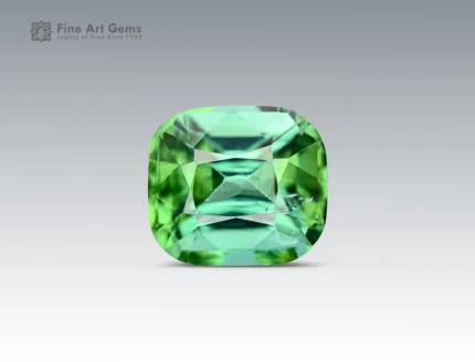 Natural mint-green cushion-cut tourmaline gemstone with bright brilliance and fine faceting from Afghanistan.