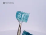 Fine, deep-blue tourmaline rough crystals from Afghanistan, with etched terminations, display quality, and are well-formed.