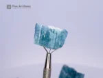 Fine, deep-blue tourmaline rough crystals from Afghanistan, with etched terminations, display quality, and are well-formed.
