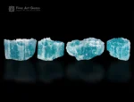 Fine, deep-blue tourmaline rough crystals from Afghanistan, with etched terminations, display quality, and are well-formed.