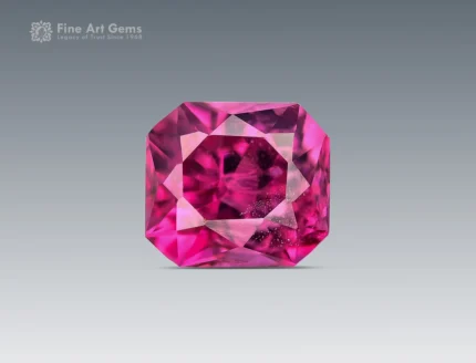 Radiant cut rhodolite garnet gemstone with vivid raspberry pink color and eye-clean clarity