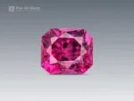 Radiant cut rhodolite garnet gemstone with vivid raspberry pink color and eye-clean clarity