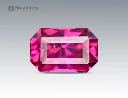 Emerald cut rhodolite garnet 1.15 carat hot pink gemstone from Africa, eye clean