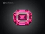 Asscher cut rhodolite garnet gemstone with vivid raspberry pink color and eye-clean clarity